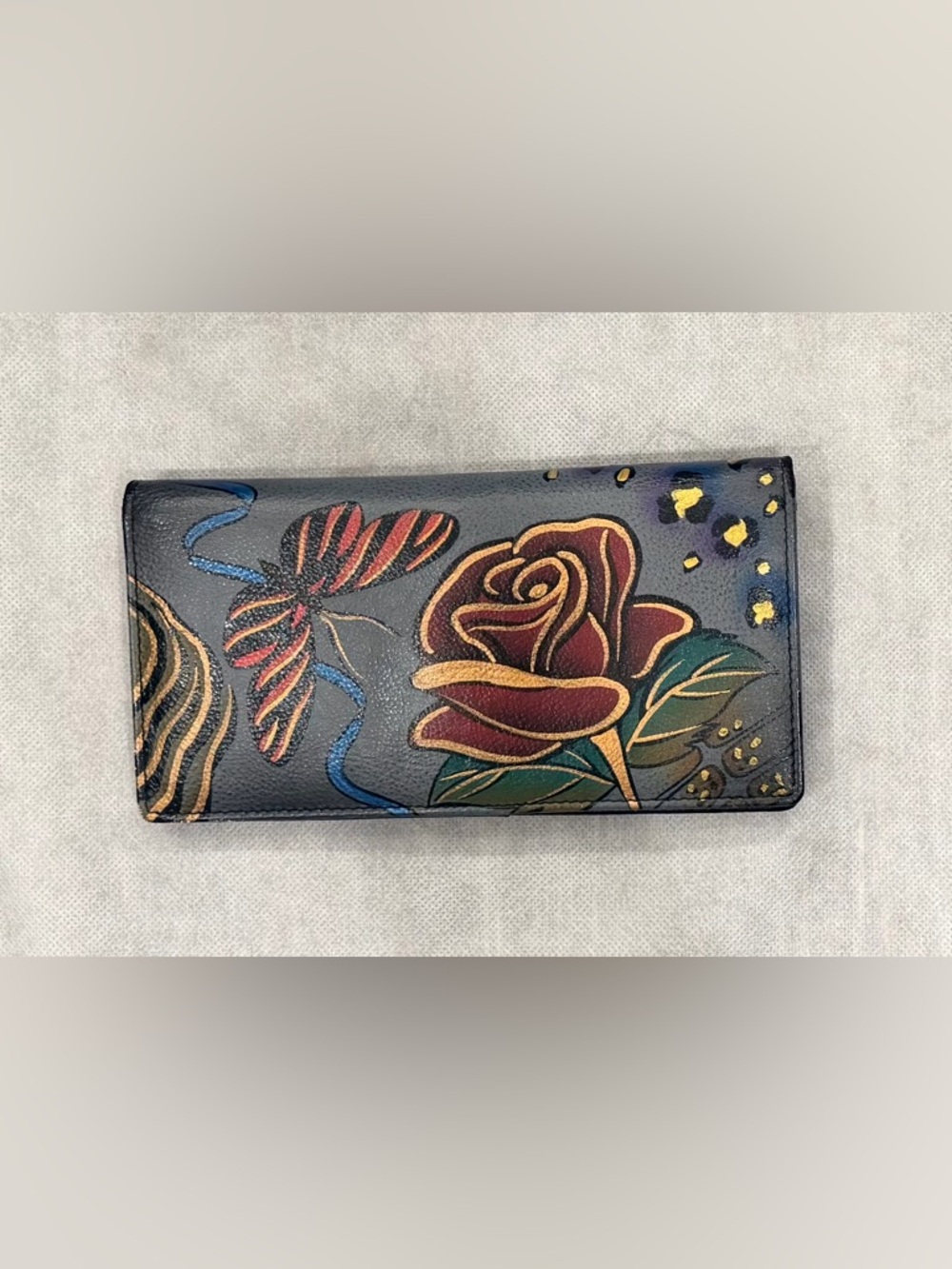 Anuschka Hand-Painted Navy Wallet with Rose and Butterfly Motif